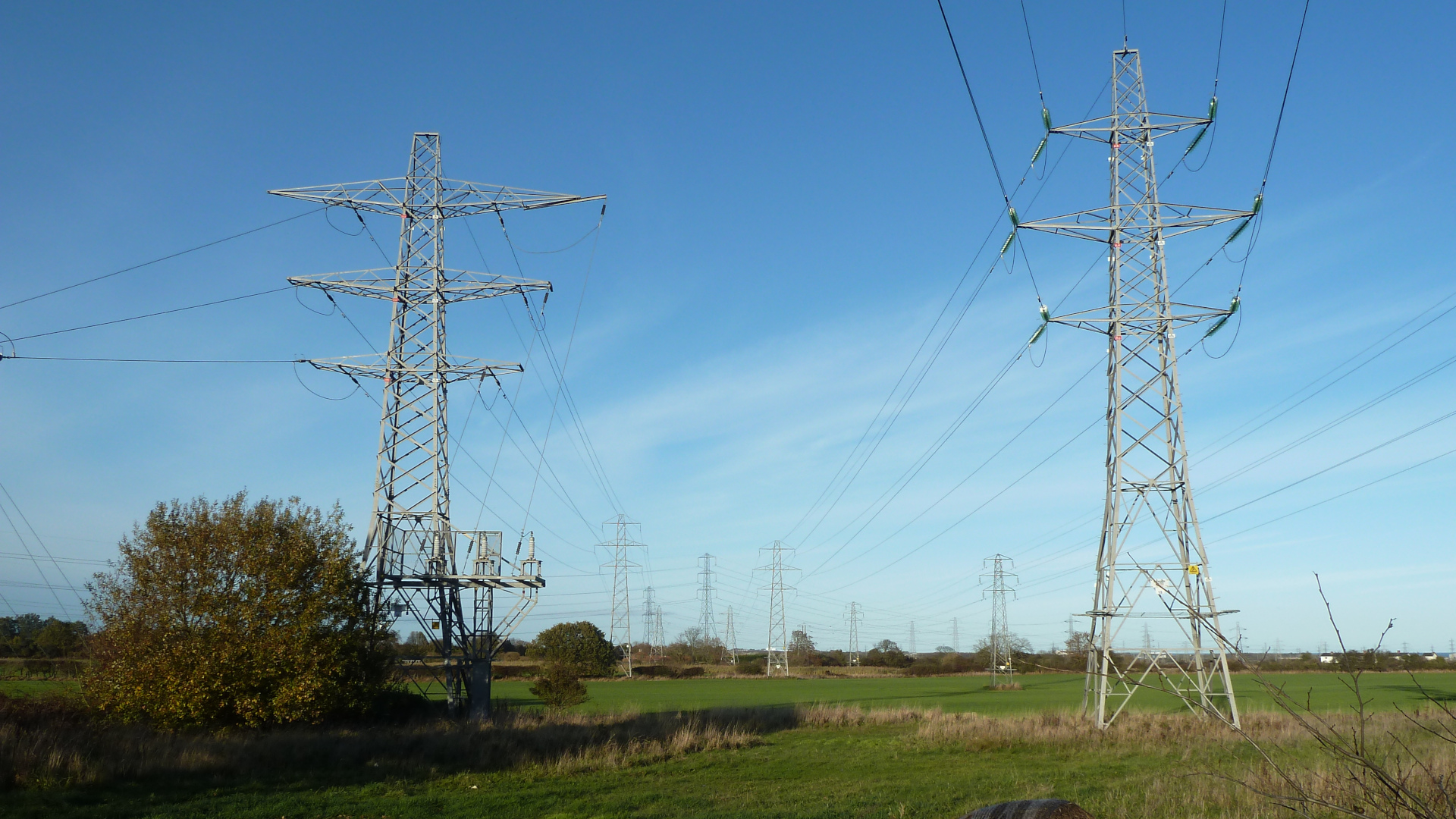two power grid in front of the picture and other power grids behind