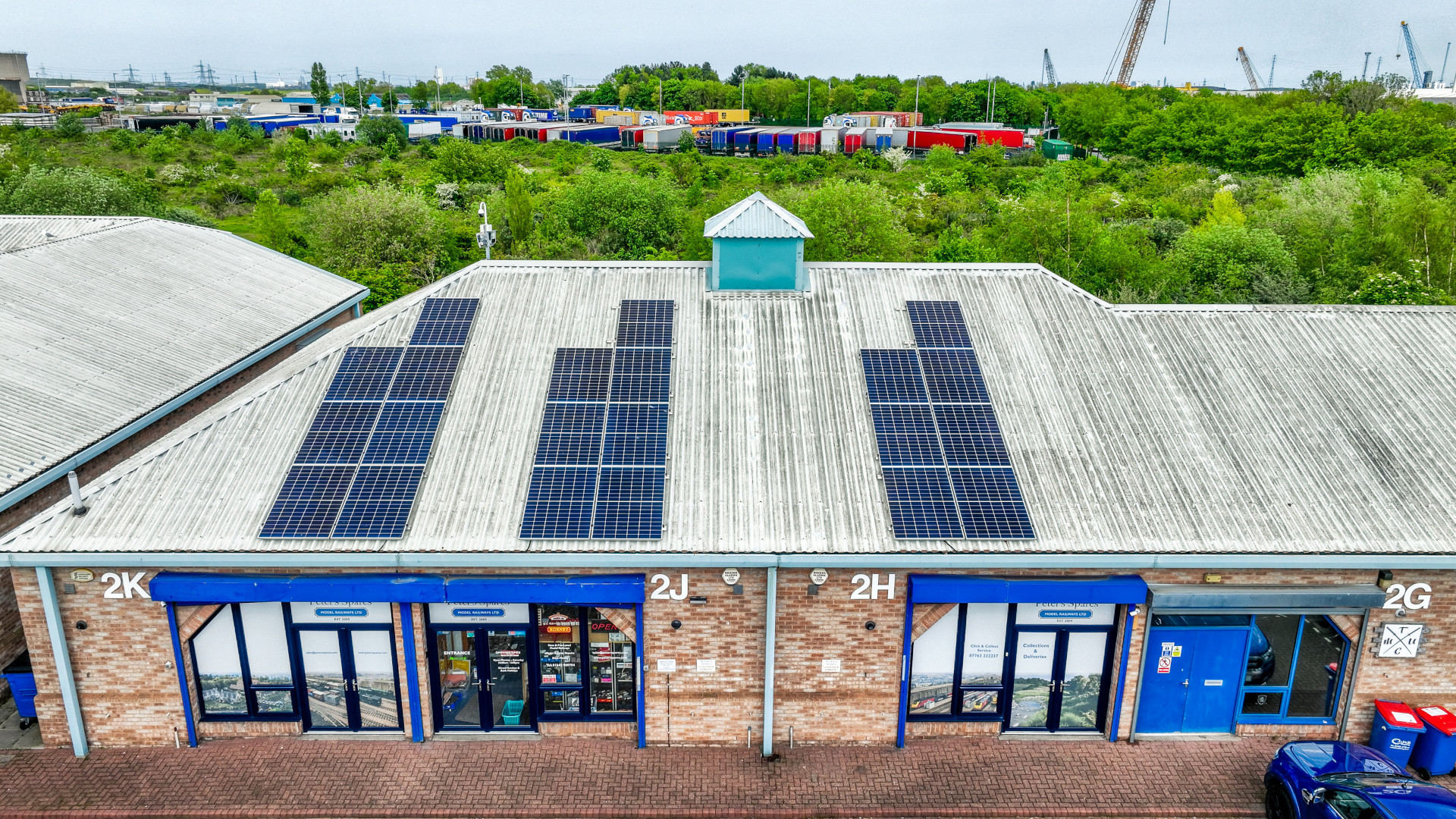 solar pannel in a store behind plants