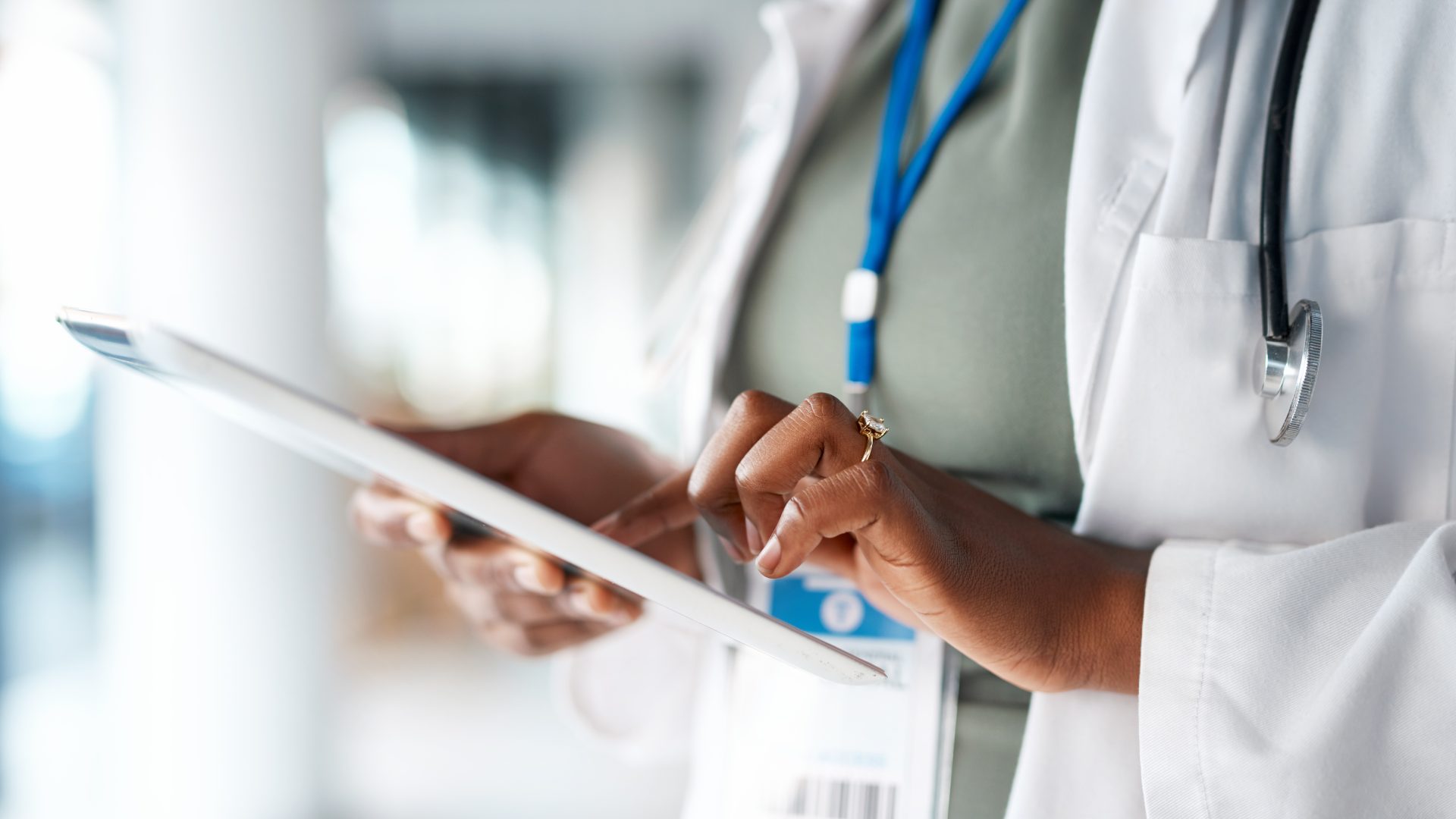Doctor with tablet in hands at hospital