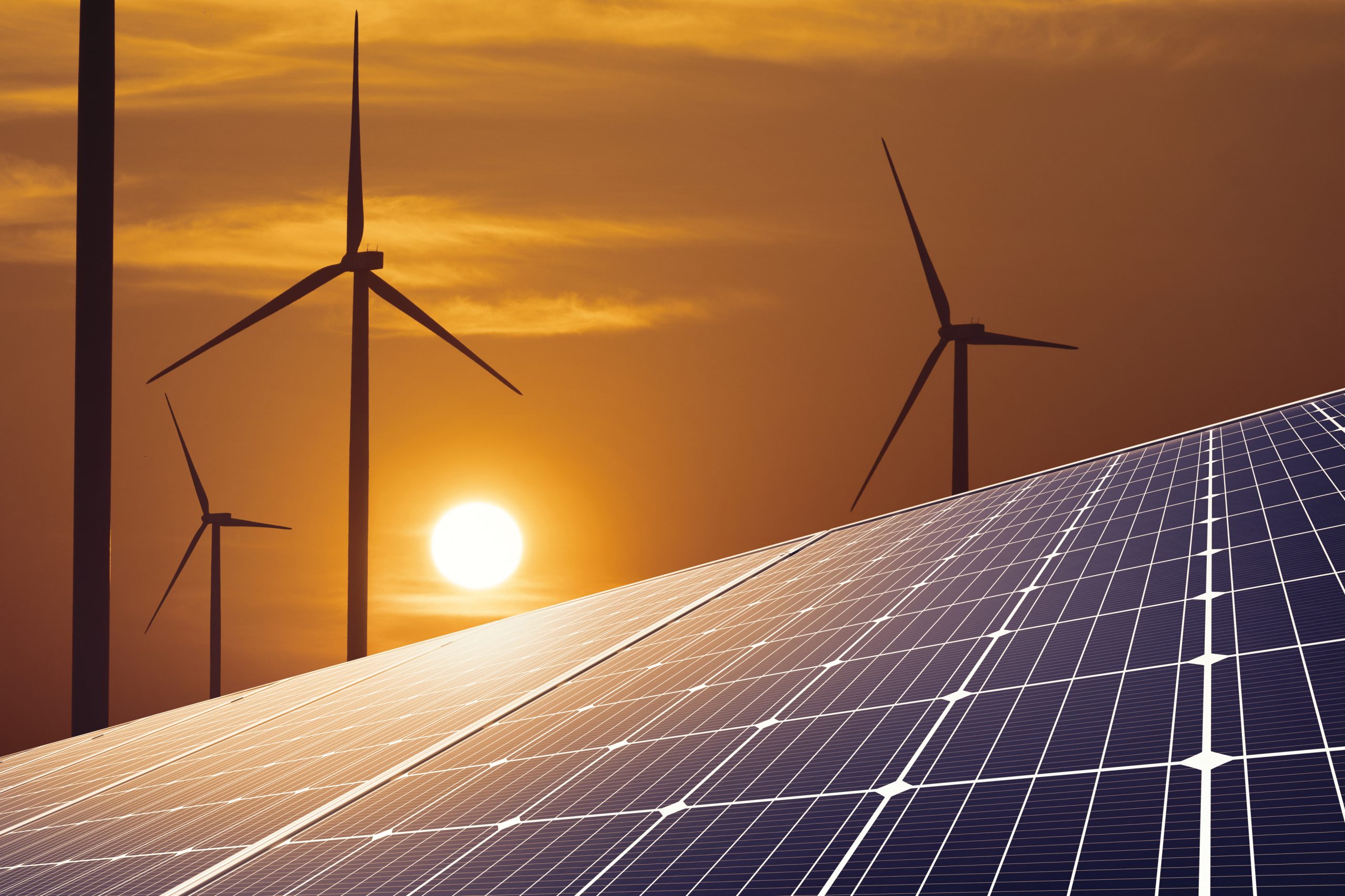 Wind turbine and solar panels at sunset concept clean energy. Energy supply, wind turbine, eolic turbine, distribution of energy, Powerplant,energy transmission,high voltage supply concept